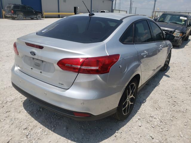 1FADP3H22HL303432 VC8498OI\
                 - FORD FOCUS  2017 IMG - 3